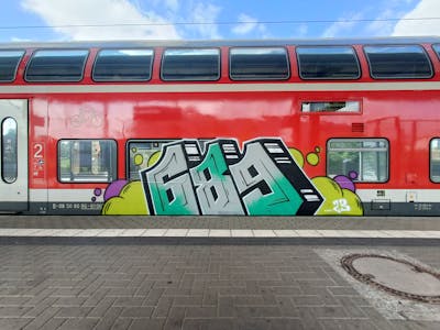 Grey and Colorful Stylewriting by 689 and 689ers. This Graffiti is located in Dresden, Germany and was created in 2023. This Graffiti can be described as Stylewriting and Trains.