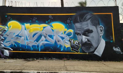 Grey and Light Blue and Yellow Characters by Buzer. This Graffiti is located in COATZACOALCOS, Mexico and was created in 2023. This Graffiti can be described as Characters and Stylewriting.