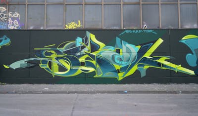 Blue and Light Green Stylewriting by Syck, ABS, KKP and Los Capitanos. This Graffiti is located in MÜNSTER, Germany and was created in 2017. This Graffiti can be described as Stylewriting and Wall of Fame.