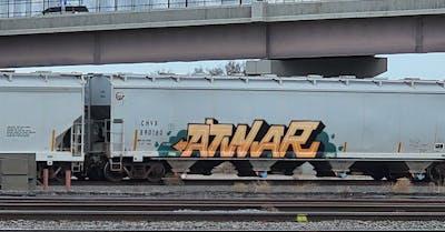 Orange Stylewriting by Atwar. This Graffiti is located in United States and was created in 2024. This Graffiti can be described as Stylewriting, Trains and Freights.