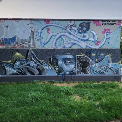 Grey and Yellow Stylewriting by Saro. This Graffiti is located in Magdeburg, Germany and was created in 2023. This Graffiti can be described as Stylewriting, Characters, Streetart and Wall of Fame.