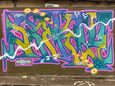 Violet and Cyan and Yellow Stylewriting by M3C and Sakey. This Graffiti is located in Jambi City, Indonesia and was created in 2022.
