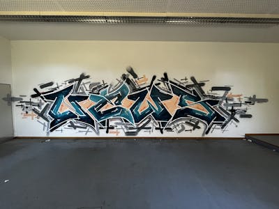 Cyan and Black Stylewriting by News. This Graffiti is located in Regensburg, Germany and was created in 2022. This Graffiti can be described as Stylewriting and Abandoned.