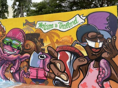 Colorful Characters by Mons, sang and toey. This Graffiti is located in Pattaya, Thailand and was created in 2022.