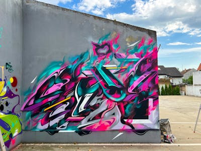 Colorful Stylewriting by SNUZ. This Graffiti is located in OSIJEK, Croatia and was created in 2023.