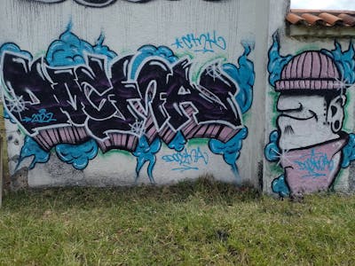 Colorful Stylewriting by DOGMA. This Graffiti is located in Popayán, Colombia and was created in 2022. This Graffiti can be described as Stylewriting, Characters and Abandoned.