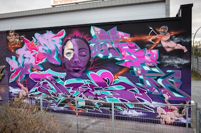 Violet and Cyan Stylewriting by KASER, dejoe, Tron26, Saf and Cors One. This Graffiti is located in Berlin, Germany and was created in 2022. This Graffiti can be described as Stylewriting, Murals and Characters.