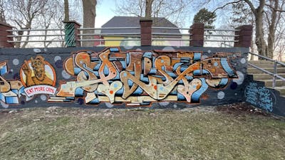 Brown and Light Blue Stylewriting by Spast and Finals Crew. This Graffiti is located in Hettstedt, Germany and was created in 2022. This Graffiti can be described as Stylewriting and Characters.