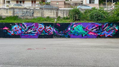 Colorful and Cyan and Violet Stylewriting by Spant and SNUZ. This Graffiti is located in Levadia, Greece and was created in 2023. This Graffiti can be described as Stylewriting and Wall of Fame.