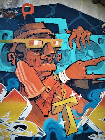 Orange and Cyan and Colorful Characters by Hades. This Graffiti is located in Sarajevo, Bosnia and Herzegovina and was created in 2018. This Graffiti can be described as Characters and Roll Up.