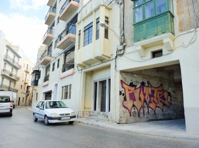 Orange and Violet Stylewriting by Riots. This Graffiti is located in Malta and was created in 2013. This Graffiti can be described as Stylewriting and Street Bombing.