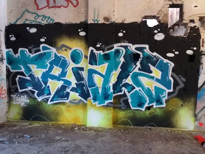 Cyan and Yellow Stylewriting by Trias. This Graffiti is located in Germany and was created in 2020. This Graffiti can be described as Stylewriting and Abandoned.