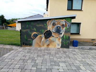 Beige and Brown and Green Characters by Fakie. This Graffiti is located in Germany and was created in 2023. This Graffiti can be described as Characters and Commission.