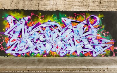 Light Blue and Colorful Stylewriting by SEWER. This Graffiti is located in Würzburg, Germany and was created in 2018.