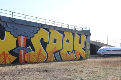 Yellow Stylewriting by Remy and Spek. This Graffiti is located in Leipzig, Germany and was created in 2022. This Graffiti can be described as Stylewriting, Murals, Street Bombing, Characters and Line Bombing.