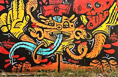 Colorful Characters by Hülpman, Sefoe, OST and PÜTK. This Graffiti is located in Athen, Greece and was created in 2020.