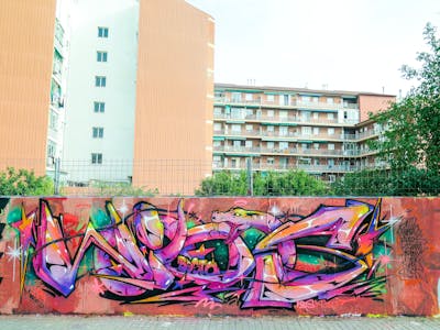 Coralle and Violet and Colorful Stylewriting by Wios. This Graffiti is located in Spain and was created in 2022.