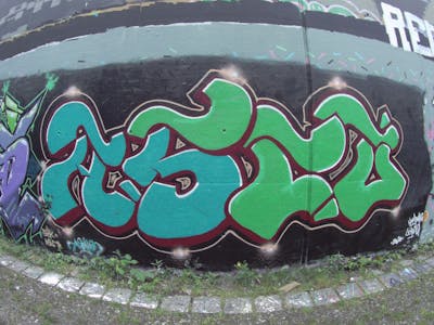 Light Green and Cyan Stylewriting by Asco. This Graffiti is located in Hamburg, Germany and was created in 2020. This Graffiti can be described as Stylewriting and Wall of Fame.