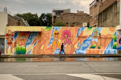 Orange Streetart by Mesek and Violenta. This Graffiti is located in Cali, Colombia and was created in 2023. This Graffiti can be described as Streetart, Murals and Stylewriting.
