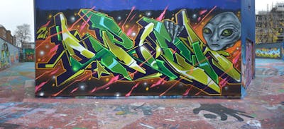 Colorful and Green and Yellow Stylewriting by Chips. This Graffiti is located in London, United Kingdom and was created in 2021. This Graffiti can be described as Stylewriting, Characters and Wall of Fame.