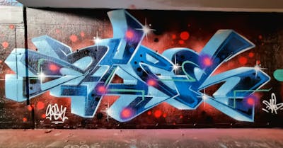 Light Blue and Red Stylewriting by Dyze. This Graffiti is located in Bern, Switzerland and was created in 2024. This Graffiti can be described as Stylewriting and Wall of Fame.
