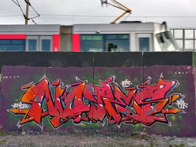 Red and Violet and Orange Stylewriting by Notes, BTS and POK. This Graffiti is located in Prague, Czech Republic and was created in 2022. This Graffiti can be described as Stylewriting and Wall of Fame.