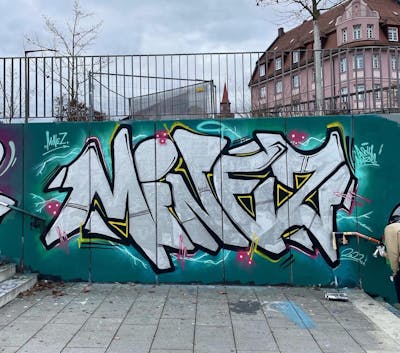 Chrome and Cyan Stylewriting by MINEZ. This Graffiti is located in Fürth, Germany and was created in 2022. This Graffiti can be described as Stylewriting and Wall of Fame.