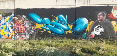 Light Blue and Colorful Stylewriting by TRAS, Posy and SKEW. This Graffiti is located in madrid, Spain and was created in 2023. This Graffiti can be described as Stylewriting and Characters.