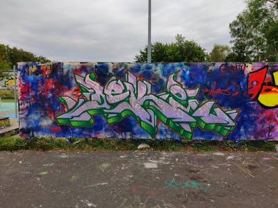 Colorful and Light Green Stylewriting by Deki and AF Crew. This Graffiti is located in Wolfenbüttel, Germany and was created in 2023. This Graffiti can be described as Stylewriting and Wall of Fame.