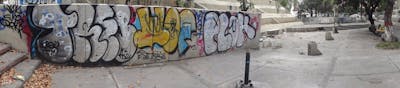 Chrome and Beige Street Bombing by treb, wof and plok. This Graffiti is located in Caracas, Venezuela and was created in 2012. This Graffiti can be described as Street Bombing and Throw Up.