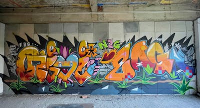 Orange and Colorful Stylewriting by Gioi* and Zaga. This Graffiti is located in Saigon, Viet Nam and was created in 2022. This Graffiti can be described as Stylewriting, Abandoned and Characters.