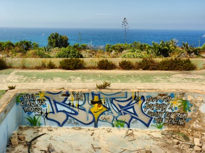 Chrome and Blue Stylewriting by Riots. This Graffiti is located in Malta and was created in 2011. This Graffiti can be described as Stylewriting, Characters and Abandoned.