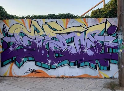 Violet and Beige and Cyan Stylewriting by Gizmo. This Graffiti is located in Moudania Greece, Greece and was created in 2023.