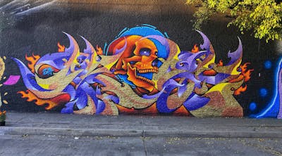 Gold and Colorful Stylewriting by Frase SF. This Graffiti is located in Guadalajara, Mexico and was created in 2021. This Graffiti can be described as Stylewriting, Characters and Futuristic.