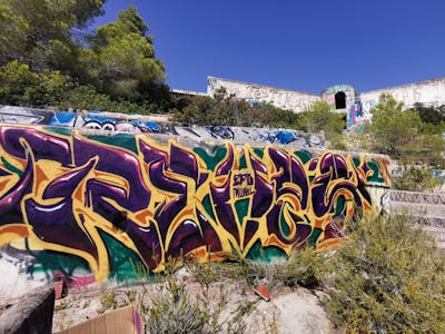 Violet and Beige and Colorful Atmosphere by Reves. This Graffiti is located in Ibiza, Spain and was created in 2023. This Graffiti can be described as Atmosphere, Abandoned and Stylewriting.