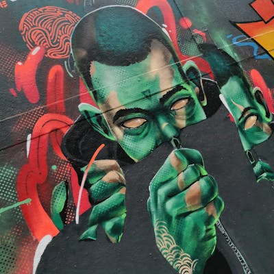 Green and Colorful Characters by REVES ONE. This Graffiti is located in United Kingdom and was created in 2022.