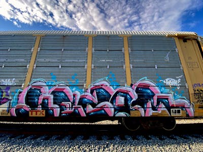 Colorful and Coralle Stylewriting by Kezam. This Graffiti is located in Vancouver, Canada and was created in 2022. This Graffiti can be described as Stylewriting, Trains, 3D and Freights.