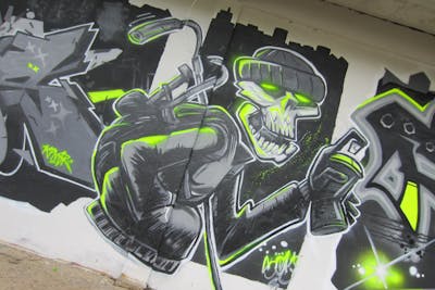Grey and Light Green Characters by Sol. This Graffiti is located in Shah Alam, Malaysia and was created in 2023.