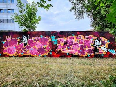 Coralle and Colorful and Red Stylewriting by Remo and Toosy. This Graffiti is located in Magdeburg, Germany and was created in 2023. This Graffiti can be described as Stylewriting, Characters and Wall of Fame.