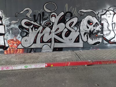 Chrome Characters by NKS. This Graffiti is located in madrid, Spain and was created in 2022. This Graffiti can be described as Characters and Stylewriting.