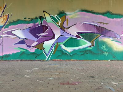 Cyan and Violet Stylewriting by Dirt. This Graffiti is located in Leipzig, Germany and was created in 2022. This Graffiti can be described as Stylewriting and Wall of Fame.