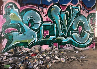 Cyan and Green Stylewriting by LTS, POWDR and Kog. This Graffiti is located in Los Angeles, United States and was created in 2022. This Graffiti can be described as Stylewriting and Abandoned.