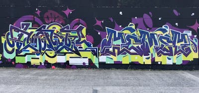 Colorful and Light Green and Violet Stylewriting by Toner2, Hemsy and OTZ Crew. This Graffiti is located in Brussels, Belgium and was created in 2023.