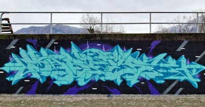 Violet and Cyan and Black Stylewriting by SABOTER. This Graffiti is located in Switzerland and was created in 2022.
