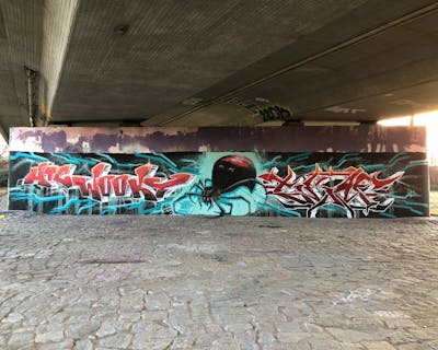 Red and Cyan Stylewriting by fatman44, Skaf, ATC, ONB and WOOKY. This Graffiti is located in Dresden, Germany and was created in 2022. This Graffiti can be described as Stylewriting, Characters and Wall of Fame.