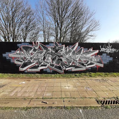 Grey Stylewriting by Acide4000 and cbx. This Graffiti is located in Liège, Belgium and was created in 2022.