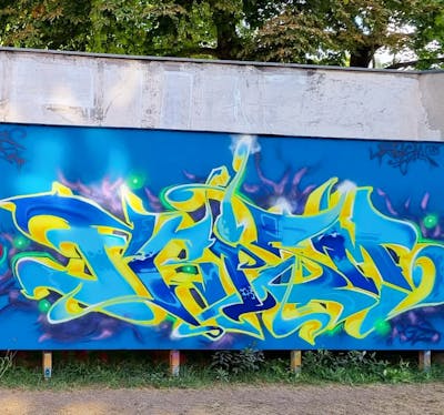 Yellow and Light Blue Stylewriting by Frism, 18K Gang and HGS Crew. This Graffiti is located in Berlin, Germany and was created in 2022.