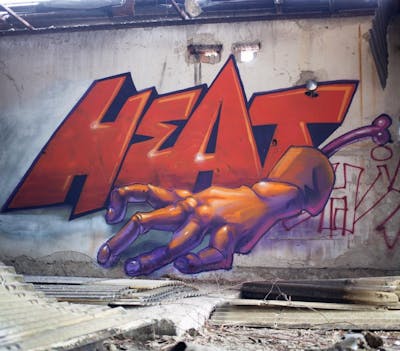 Violet and Orange Characters by Fat Heat. This Graffiti is located in Budapest, Hungary and was created in 2023. This Graffiti can be described as Characters, Stylewriting and Abandoned.