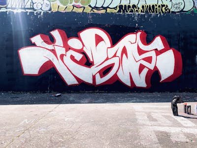 Red and White and Black Stylewriting by Jibo and MDS. This Graffiti is located in Düsseldorf, Germany and was created in 2023. This Graffiti can be described as Stylewriting and Wall of Fame.