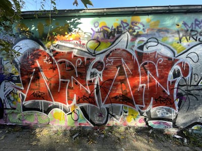 Red and White Handstyles by Twis. This Graffiti is located in Germany and was created in 2022. This Graffiti can be described as Handstyles and Wall of Fame.